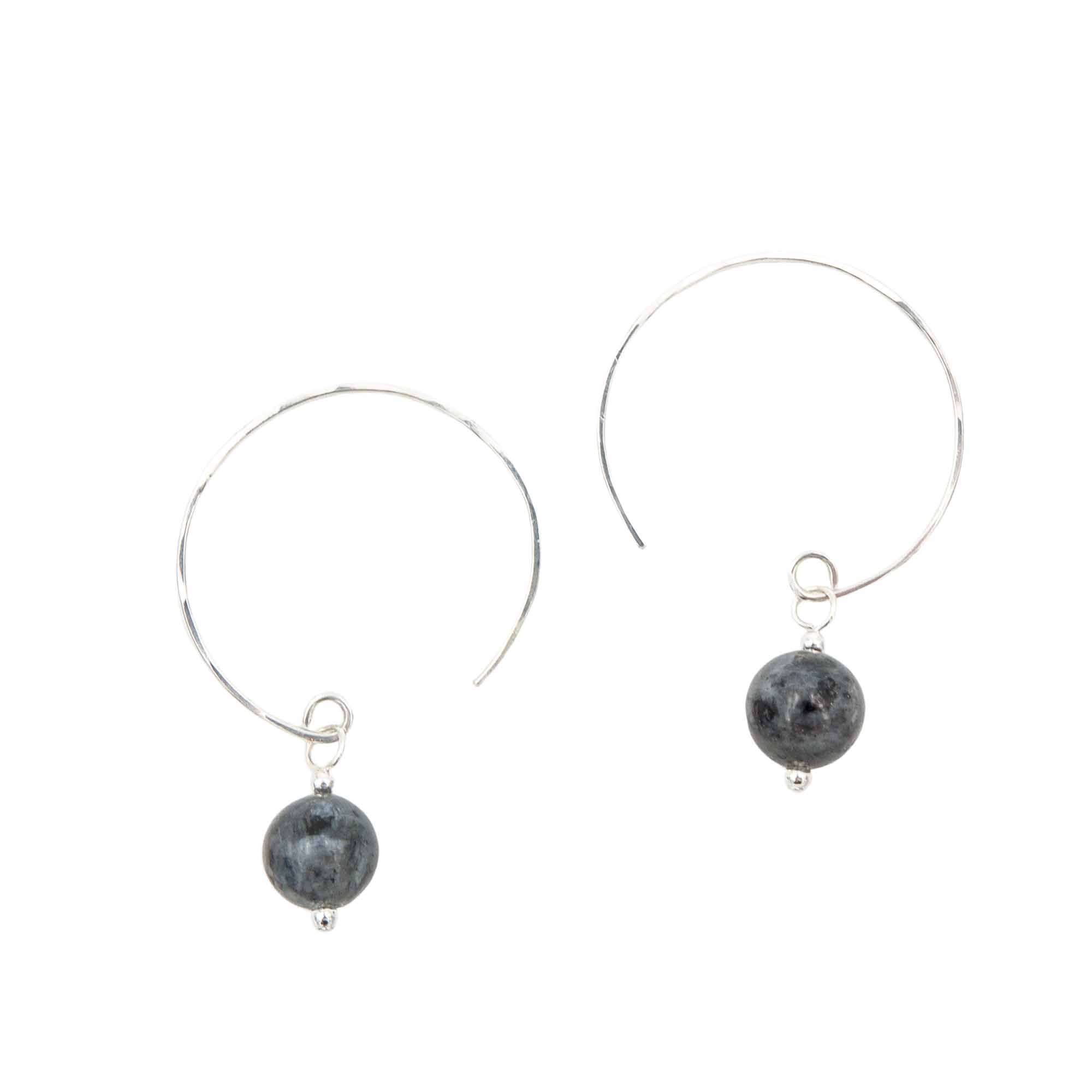 Iridescent Larvikite Hoop Curves